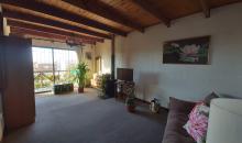 SALA DE ESTAR CON ESTUFA A LEÑA