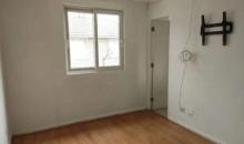Dormitorio matrimonial al fondo puerta de acceso al baño privado