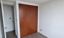 Dormitorio pequeño con vista al closet