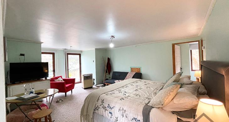 DORMITORIO PRINCIPAL CON SALA DE ESTAR, BAÑO PRIVADO, JACUZZI,  WALKING CLOSET Y TERRASA